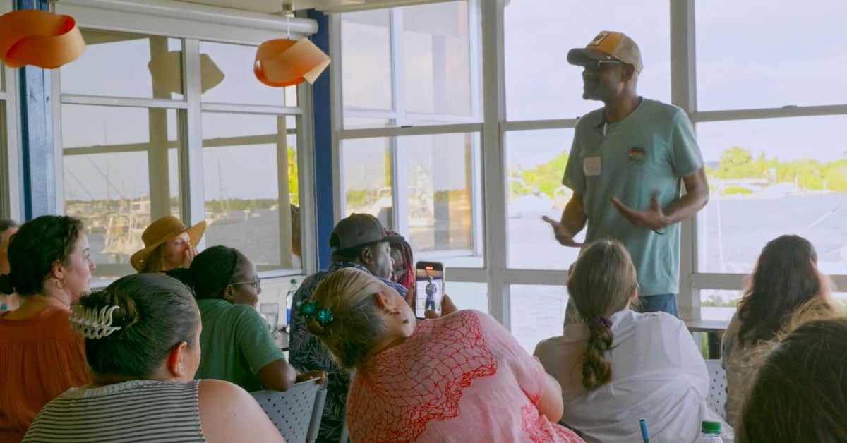 “Can you see me?” asked Artis Romero Burney, a poet and community activist