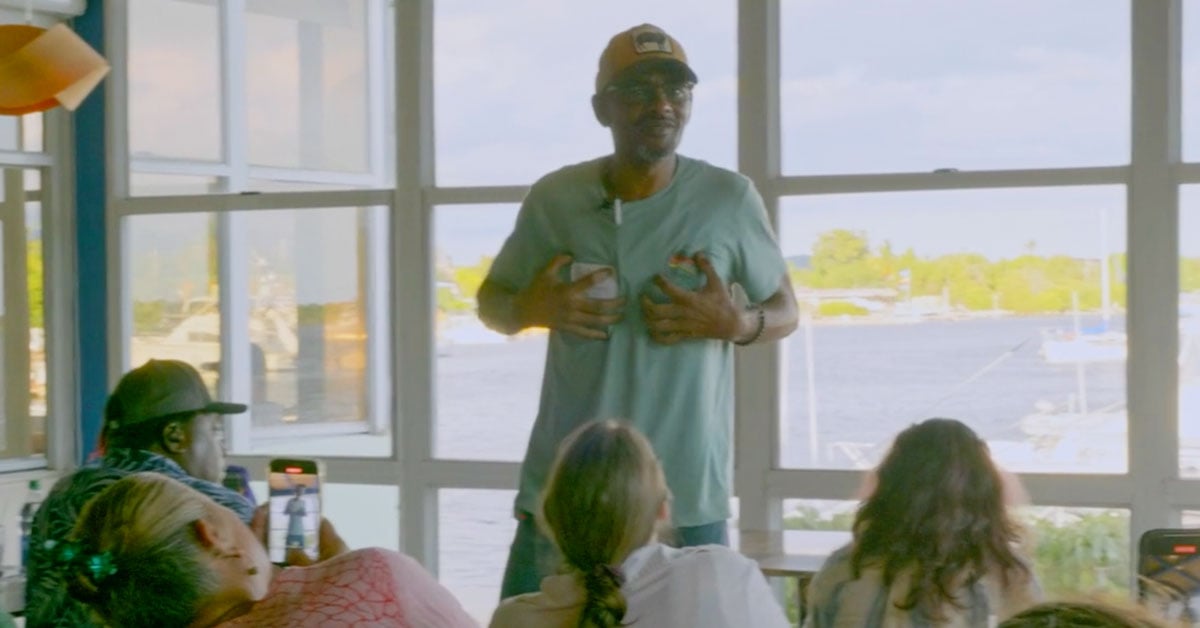 “Can you see me?” asked Artis Romero Burney, a poet and community activist
